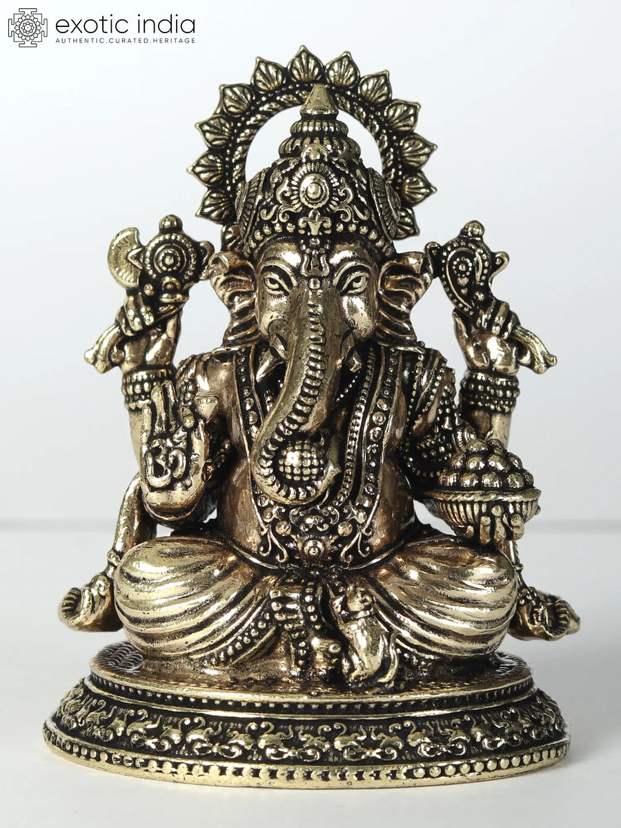 Small Chaturbhuja Lord Ganesha Brass Statue with Laddu