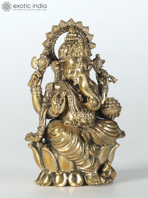 Small Chaturbhuja Lord Ganesha Brass Idol Seated on Lotus