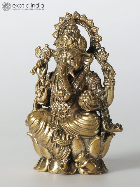 Small Chaturbhuja Lord Ganesha Brass Idol Seated on Lotus