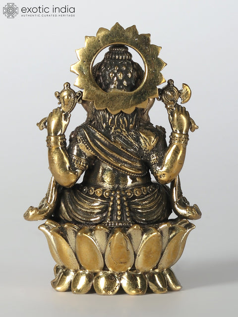 Small Chaturbhuja Lord Ganesha Brass Idol Seated on Lotus