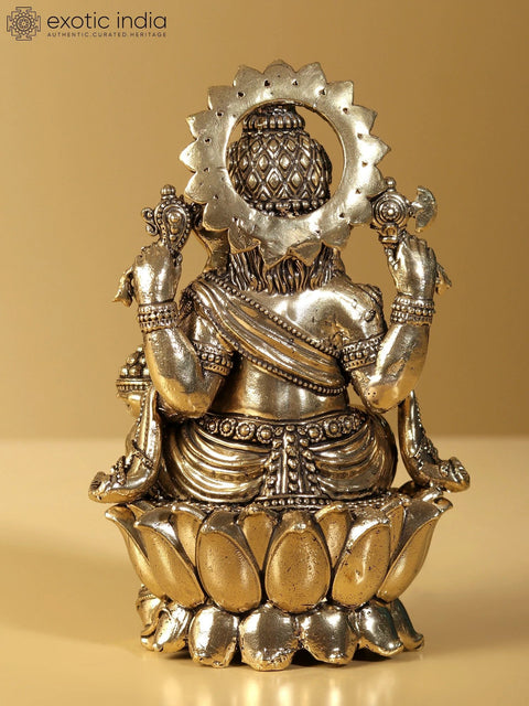 Small Chaturbhuja Lord Ganesha Brass Idol Seated on Lotus