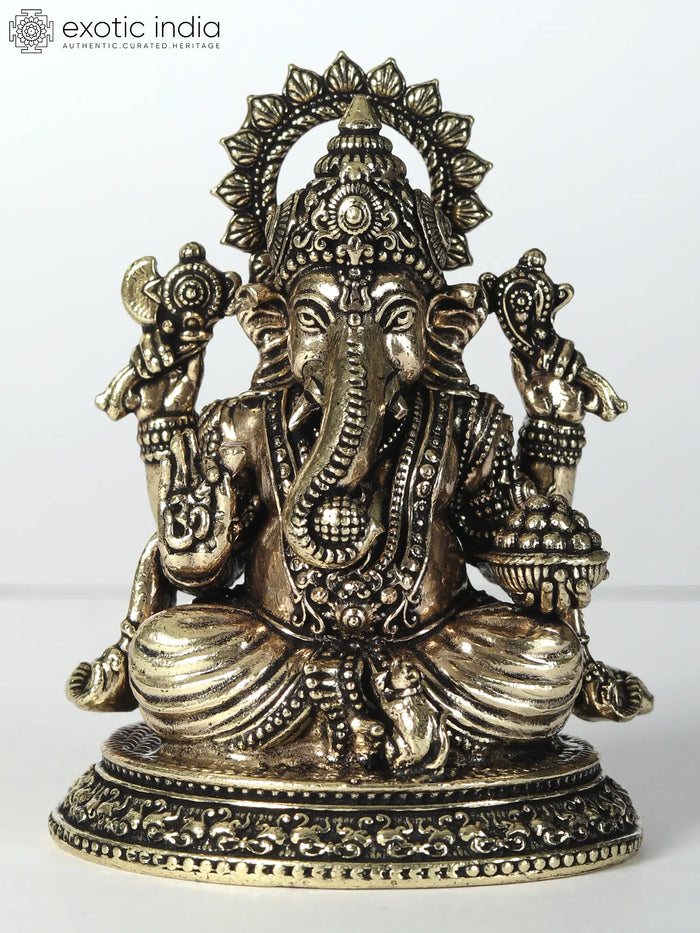 Small Chaturbhuja Lord Ganesha Brass Statue with Laddu
