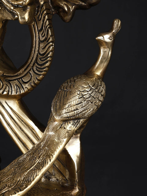 KrishnaÕs Inimitable Magnificence (Large Murli Manohar Lord Krishna Brass Statue Standing on Lotus with Peacock)