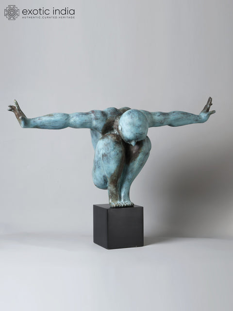 Equilibrium’s Edge: The Olympic Swimmer | Brass Sculpture from Indonesia