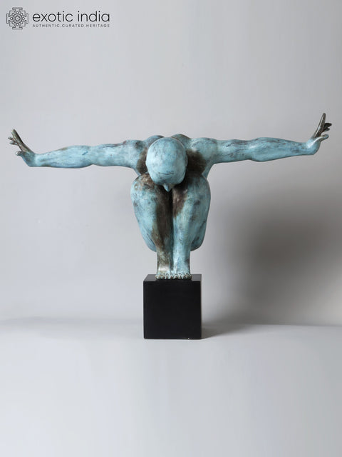 Equilibrium’s Edge: The Olympic Swimmer | Brass Sculpture from Indonesia