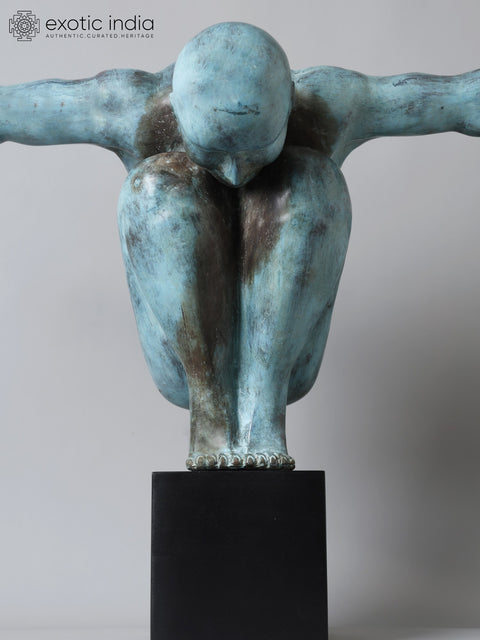 Equilibrium’s Edge: The Olympic Swimmer | Brass Sculpture from Indonesia