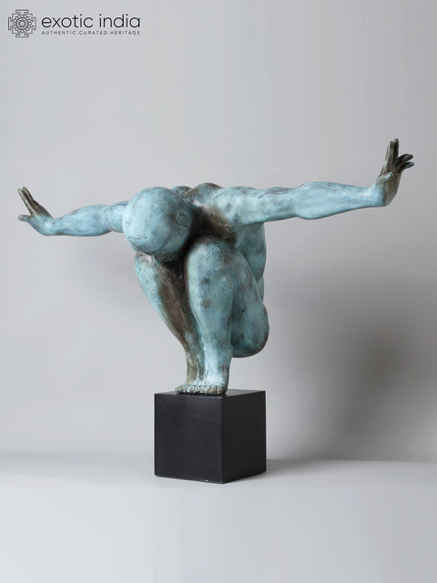 Equilibrium’s Edge: The Olympic Swimmer | Brass Sculpture from Indonesia