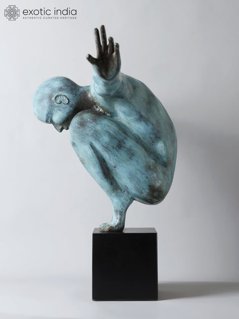 Equilibrium’s Edge: The Olympic Swimmer | Brass Sculpture from Indonesia