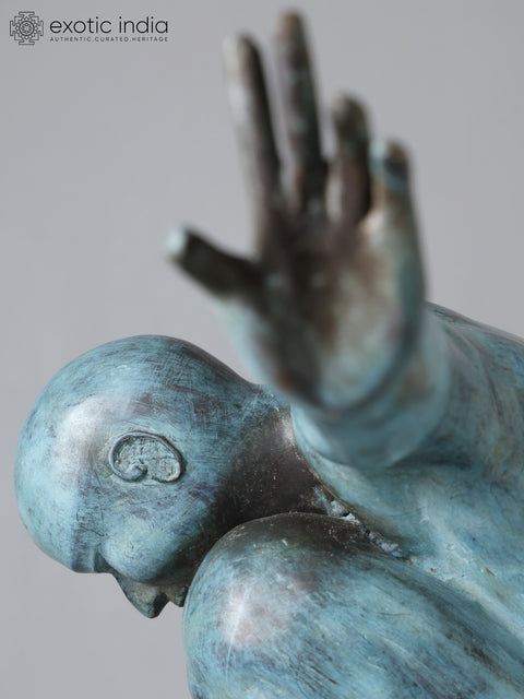 Equilibrium’s Edge: The Olympic Swimmer | Brass Sculpture from Indonesia