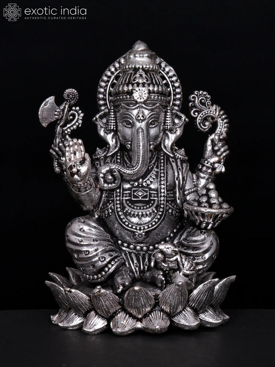 Small Four-Armed Lord Ganesha Handmade Brass Statue on Lotus