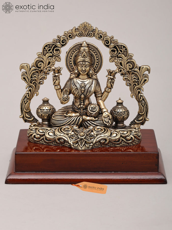 5" Four Armed Dhanalakshmi Brass Idol with Wood Base