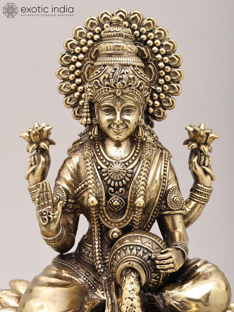 9" Superfine Four Armed Goddess Lakshmi with Peacock Lamp and Wood Base | Brass Idol