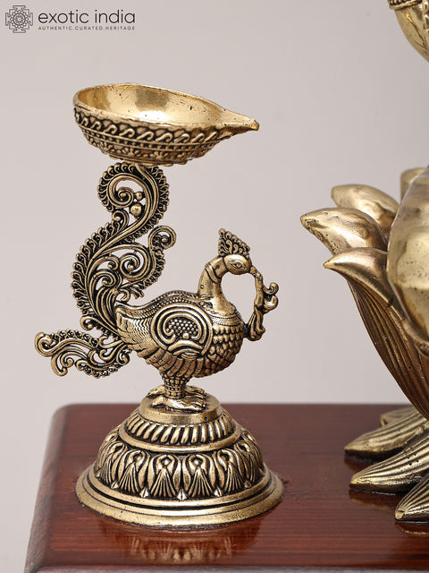 9" Superfine Four Armed Goddess Lakshmi with Peacock Lamp and Wood Base | Brass Idol