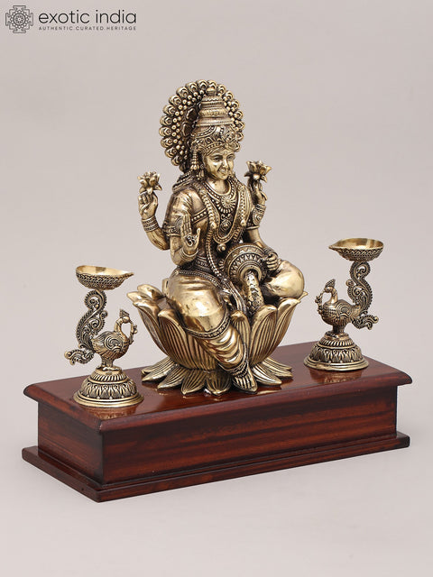 9" Superfine Four Armed Goddess Lakshmi with Peacock Lamp and Wood Base | Brass Idol