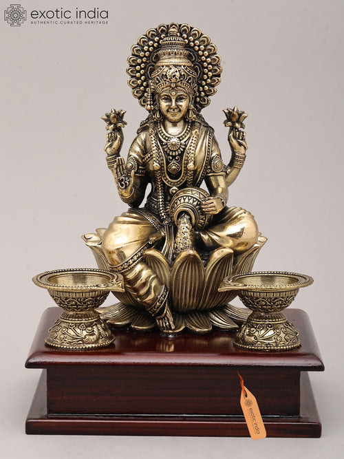 7" Handmade Dhanalakshmi Brass Statue with Oil Lamps and Wood Base