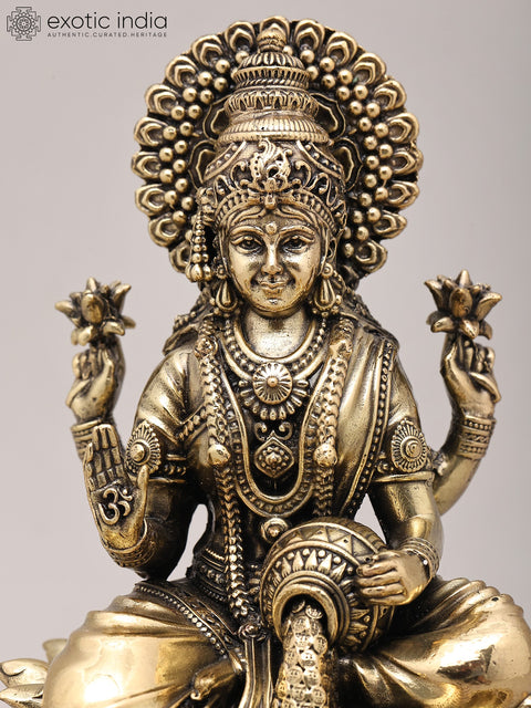 7" Superfine Seated Goddess Dhanalakshmi with Oil Lamps and Wood Base | Brass Sculpture