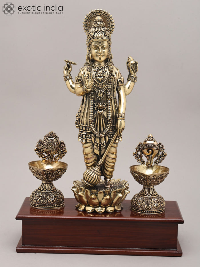 13" Four Armed Lord Vishnu Brass Idol with Oil Lamp and Wood Base