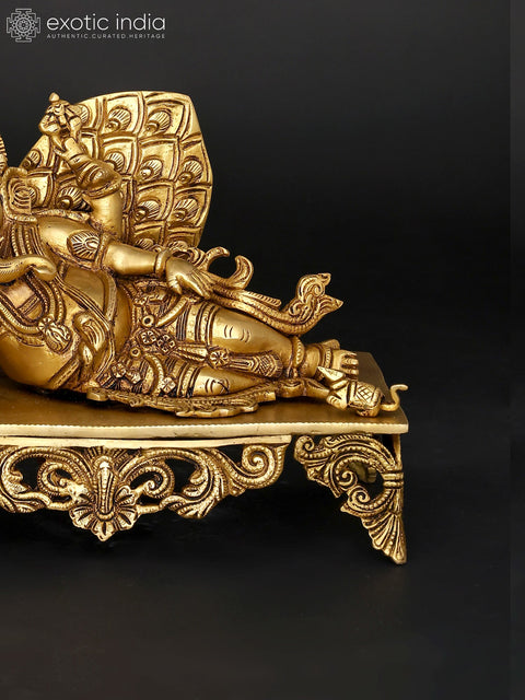 11" Four Armed Relaxing Lord Ganesha with Peacock | Brass Statue