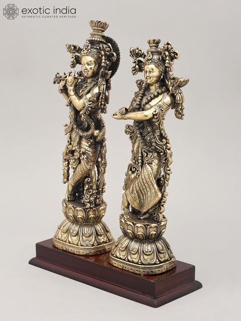 Superfine Divine Pair: Lord Krishna and Radha Standing on Lotus with Wood Base | Brass Idol