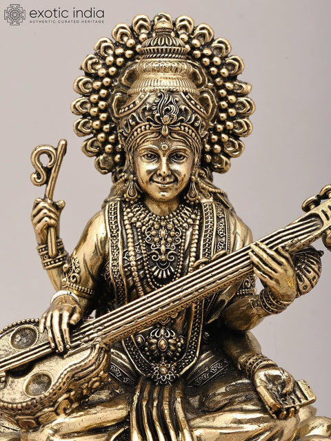 9" Superfine Goddess Saraswati Playing Sitar with Peacock Oil Lamp on Wood Base | Brass Statue