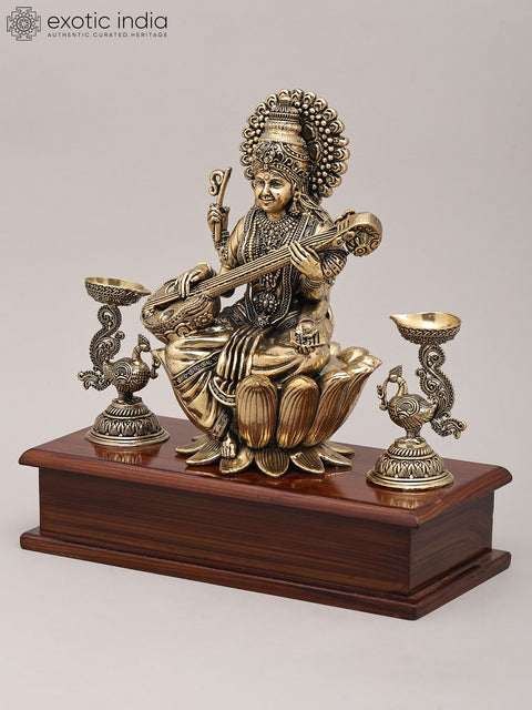 9" Superfine Goddess Saraswati Playing Sitar with Peacock Oil Lamp on Wood Base | Brass Statue