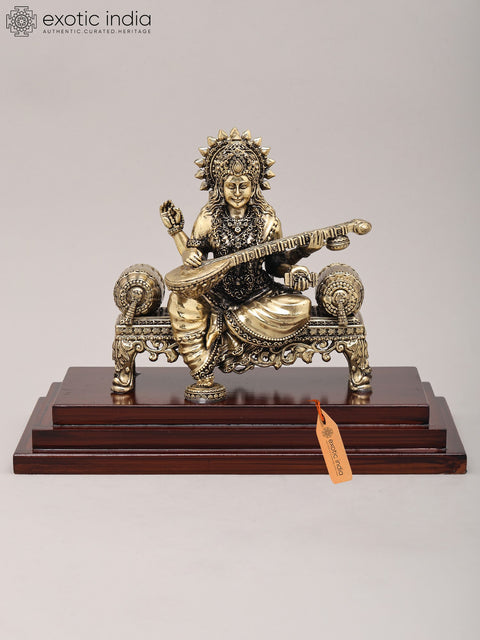 9" Superfine Goddess Saraswati Seated on Asana and Playing Sitar with Wood Base | Brass Idol