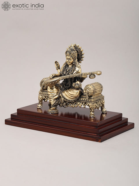 9" Superfine Goddess Saraswati Seated on Asana and Playing Sitar with Wood Base | Brass Idol