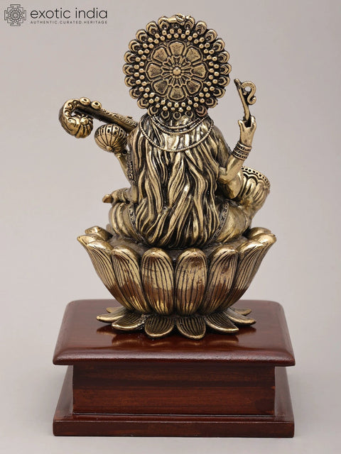 Superfine Seated Four Armed Goddess Saraswati with Wood Base | Brass Idol