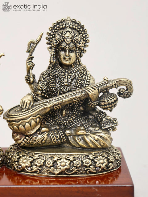 7" Superfine Trio of Goddess Lakshmi, Lord Ganesha and Goddess Saraswati with Wood Base | Brass Idol