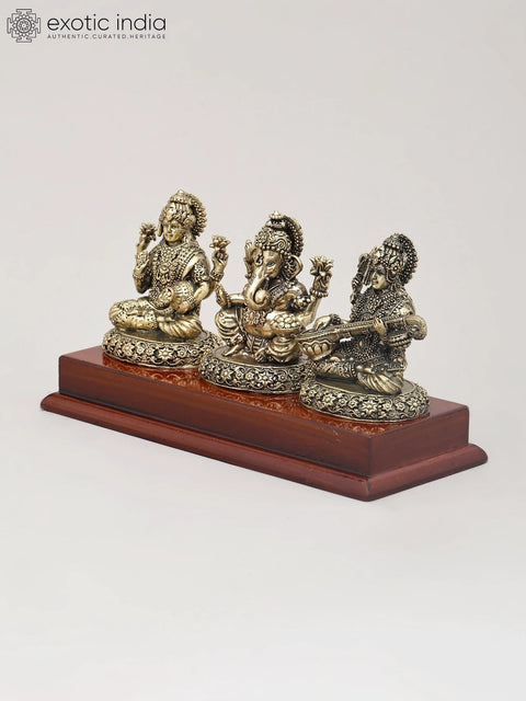 7" Superfine Trio of Goddess Lakshmi, Lord Ganesha and Goddess Saraswati with Wood Base | Brass Idol