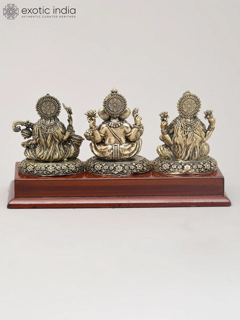 7" Superfine Trio of Goddess Lakshmi, Lord Ganesha and Goddess Saraswati with Wood Base | Brass Idol