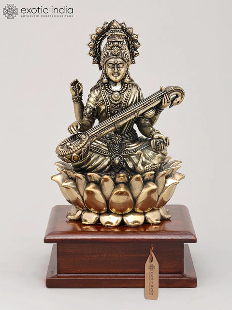 7" Superfine Chaturbhuja Goddess Saraswati Seated on Lotus with Wood Base | Brass Sculpture