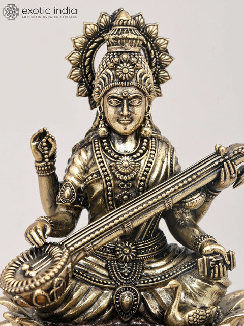 7" Superfine Chaturbhuja Goddess Saraswati Seated on Lotus with Wood Base | Brass Sculpture