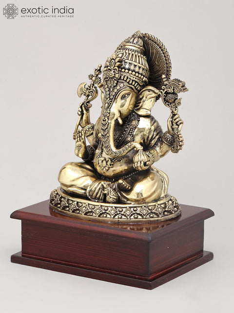 8" Superfine Chaturbhuja Lord Ganapati Holding Modak on Wood Base | Brass Statue