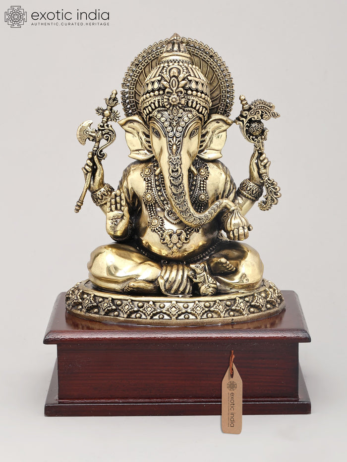 8" Handmade Chaturbhuja Ganapati Brass Statue with Modak on Wood Base