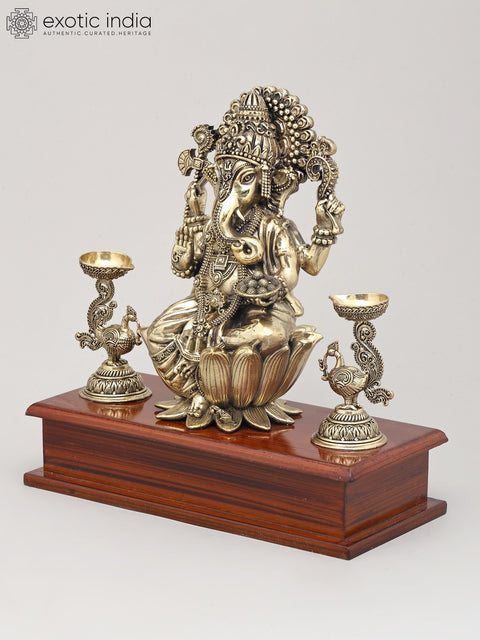9" Superfine Lord Ganesha Seated on Lotus with Oil Lamps and Wood Base | Brass Sculpture