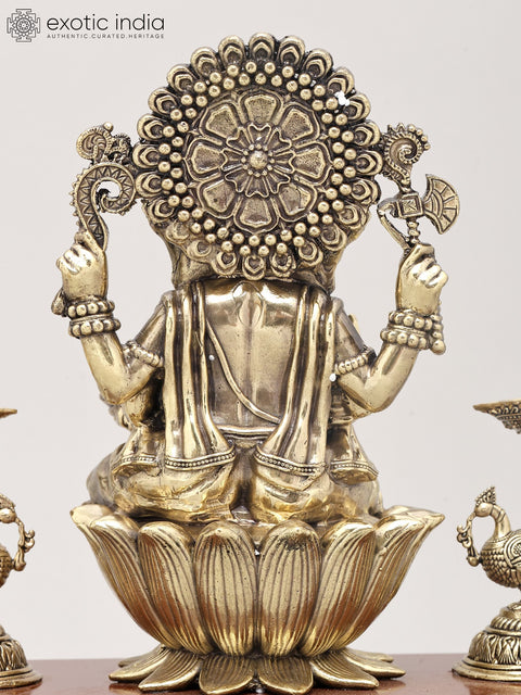 9" Superfine Lord Ganesha Seated on Lotus with Oil Lamps and Wood Base | Brass Sculpture