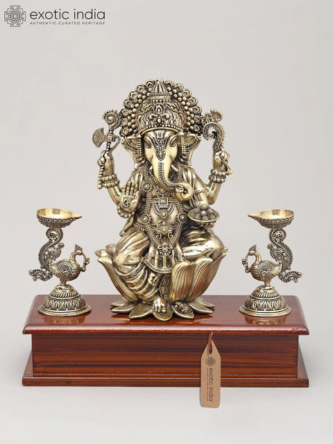 9" Superfine Lord Ganesha Seated on Lotus with Oil Lamps and Wood Base | Brass Sculpture