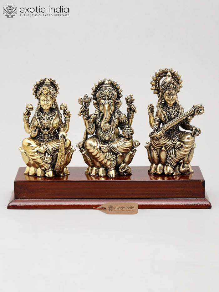 7" Lakshmi Ganesha Saraswati Brass Idol Seated on Wood Base