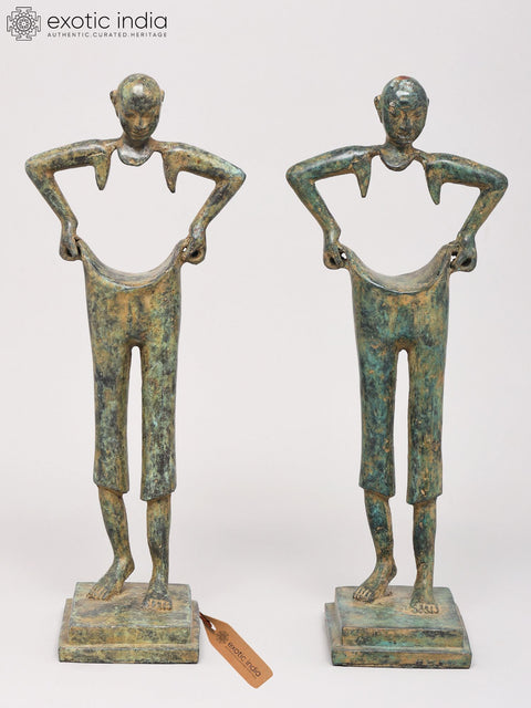 Artistic Pair of Elongated Human Figures
