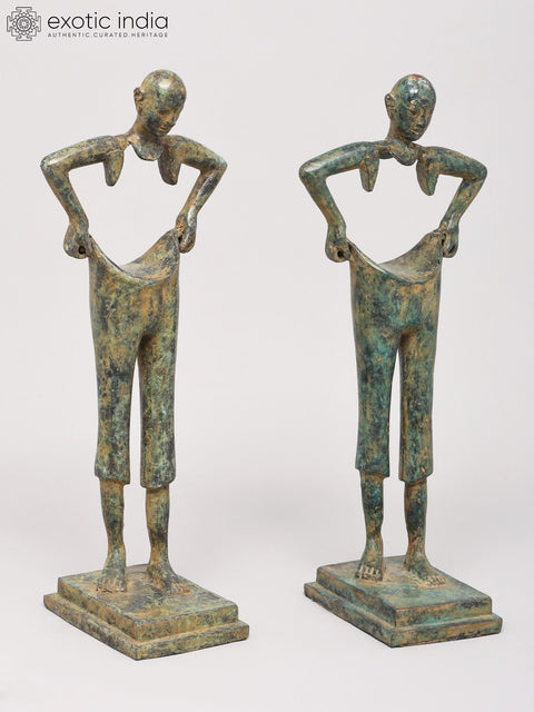 Artistic Pair of Elongated Human Figures