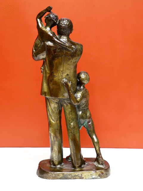 Brass Man with Kids