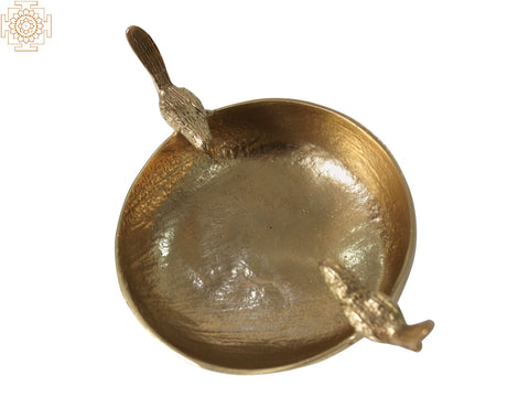 Bowls with Birds Perched on the Edge