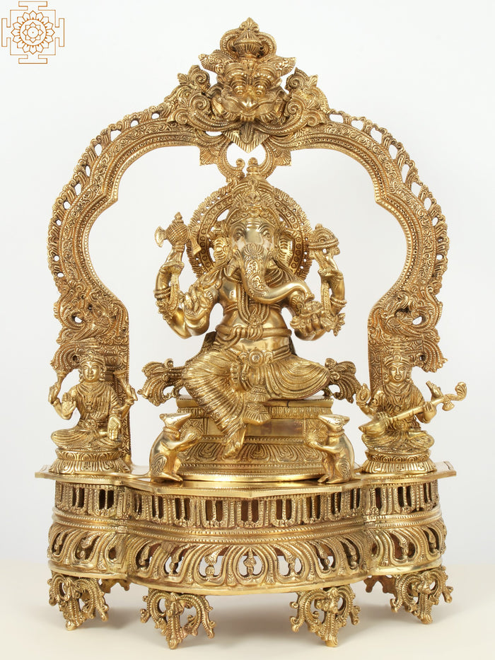 22" Superfine Brass Lord Ganapati Seated on Kirtimukha Throne with Goddess Lakshmi and Goddess Saraswati