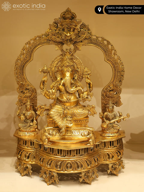 22" Superfine Brass Lord Ganapati Seated on Kirtimukha Throne with Goddess Lakshmi and Goddess Saraswati