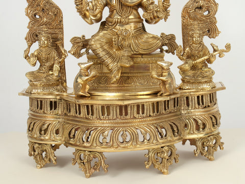 22" Superfine Brass Lord Ganapati Seated on Kirtimukha Throne with Goddess Lakshmi and Goddess Saraswati