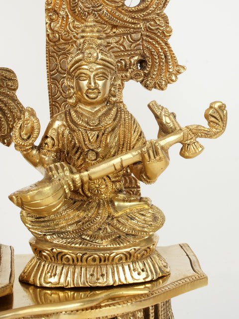 22" Superfine Brass Lord Ganapati Seated on Kirtimukha Throne with Goddess Lakshmi and Goddess Saraswati
