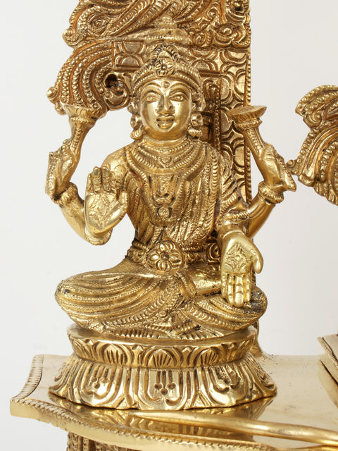 22" Superfine Brass Lord Ganapati Seated on Kirtimukha Throne with Goddess Lakshmi and Goddess Saraswati