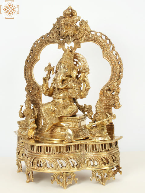 22" Superfine Brass Lord Ganapati Seated on Kirtimukha Throne with Goddess Lakshmi and Goddess Saraswati