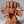 11" Sinduri Color Sitting Ten Armed Panchmukhi Lord Hanuman Brass Sculpture